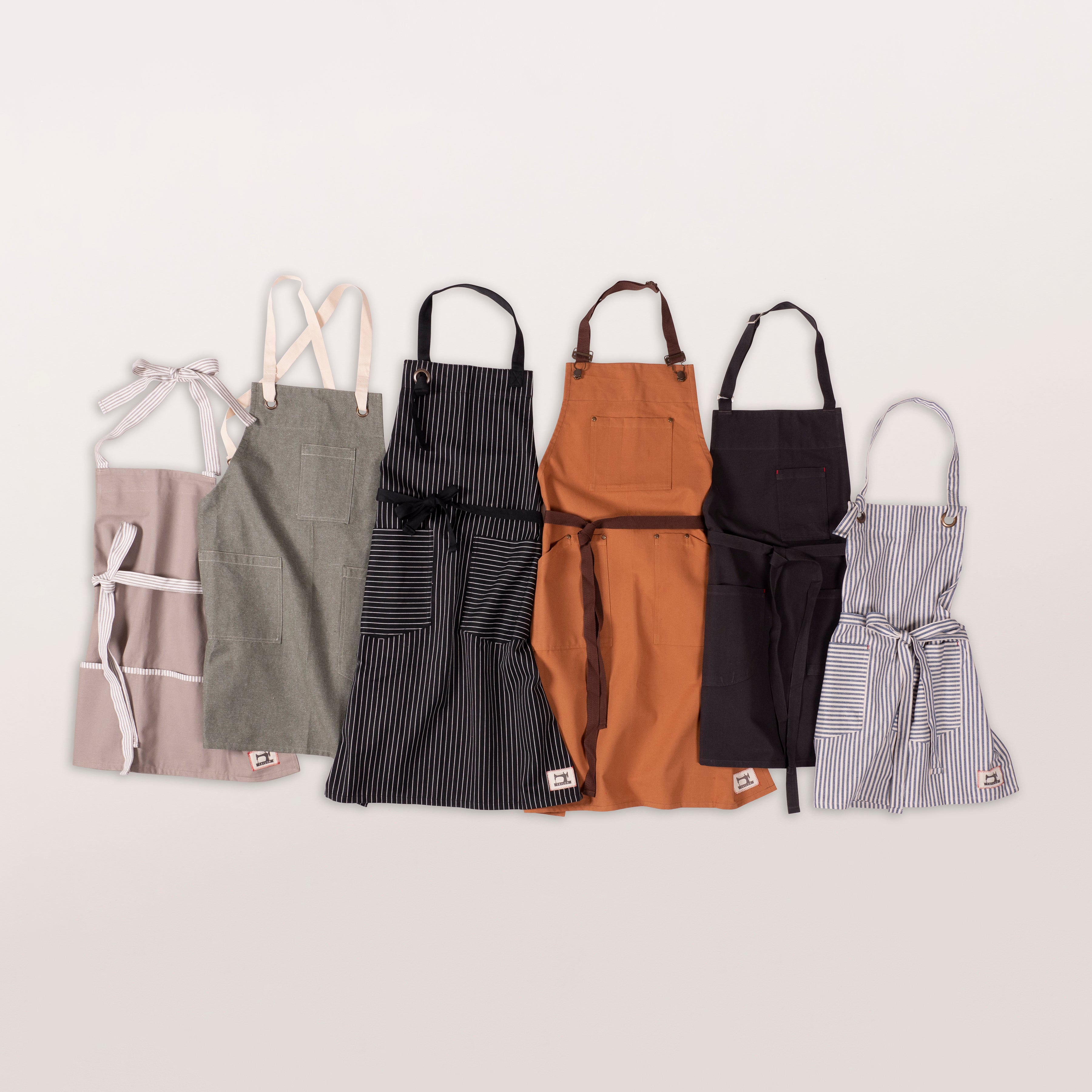 http://www.kafhome.com/cdn/shop/products/TailorAprons.jpg?v=1597340197